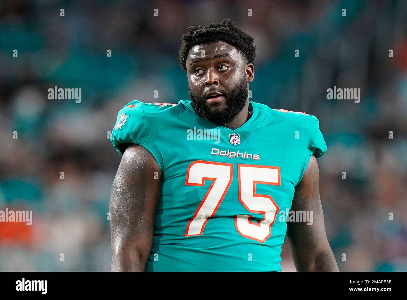 Miami Dolphins offensive tackle Greg Little (75) is shown during a timeout  in the first half of a NFL preseason football game against the Philadelphia  Eagles, Saturday, Aug. 27, 2022, in Miami