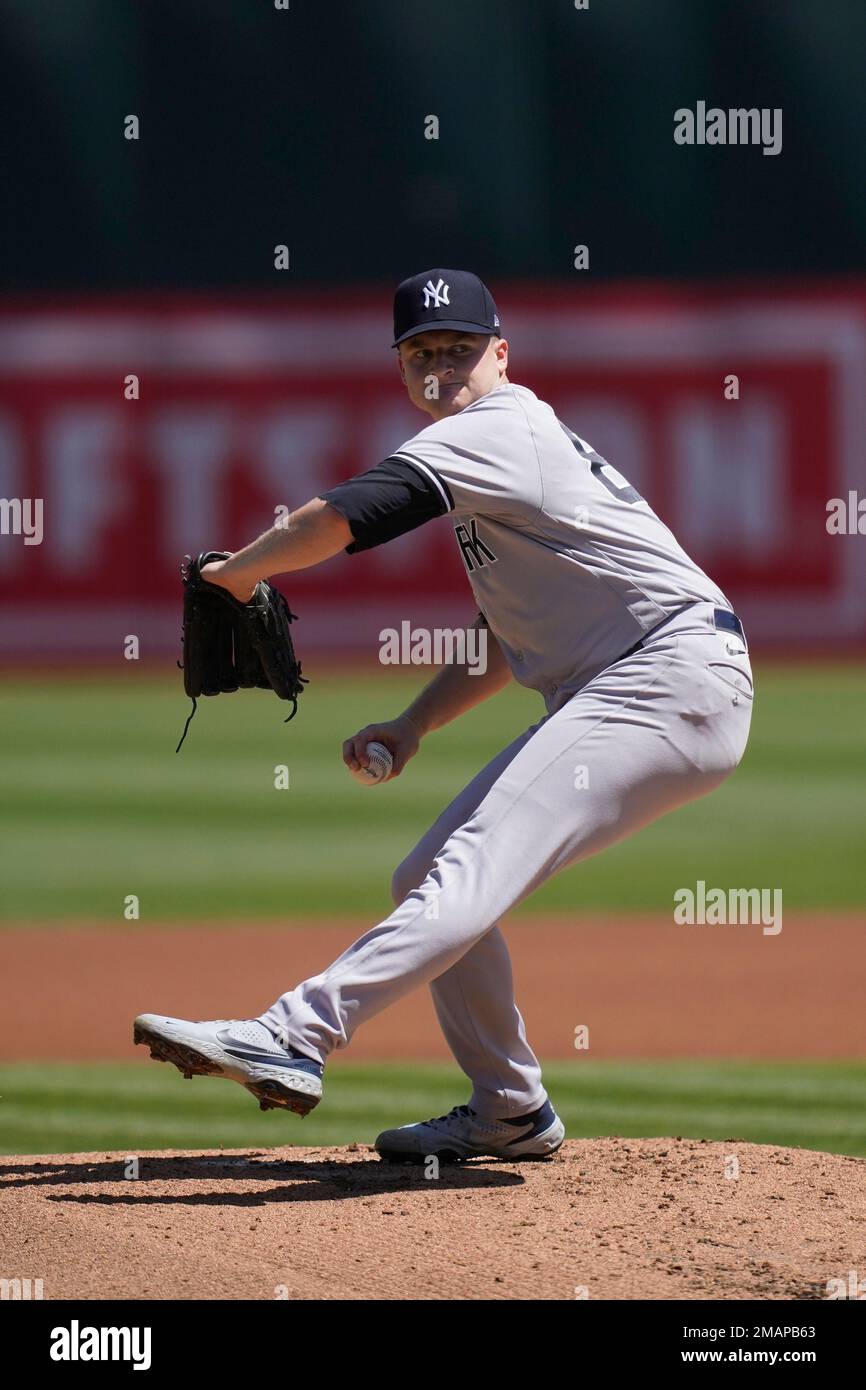 New York Yankees' Clarke Schmidt against the Oakland Athletics during a ...