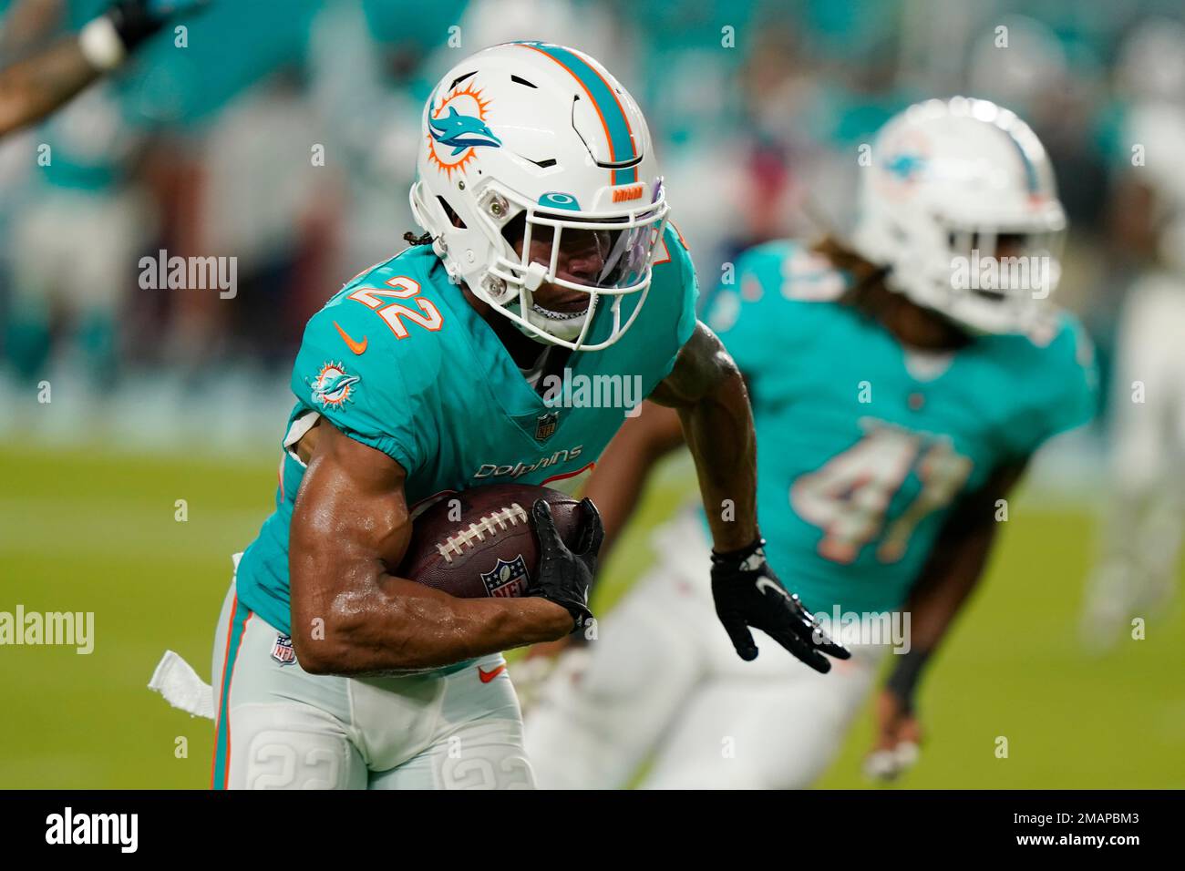 Miami Dolphins safety Elijah Campbell (22) runs during the first half of a  NFL preseason football game against the Miami Dolphins, Saturday, Aug. 27,  2022, in Miami Gardens, Fla. (AP Photo/Lynne Sladky