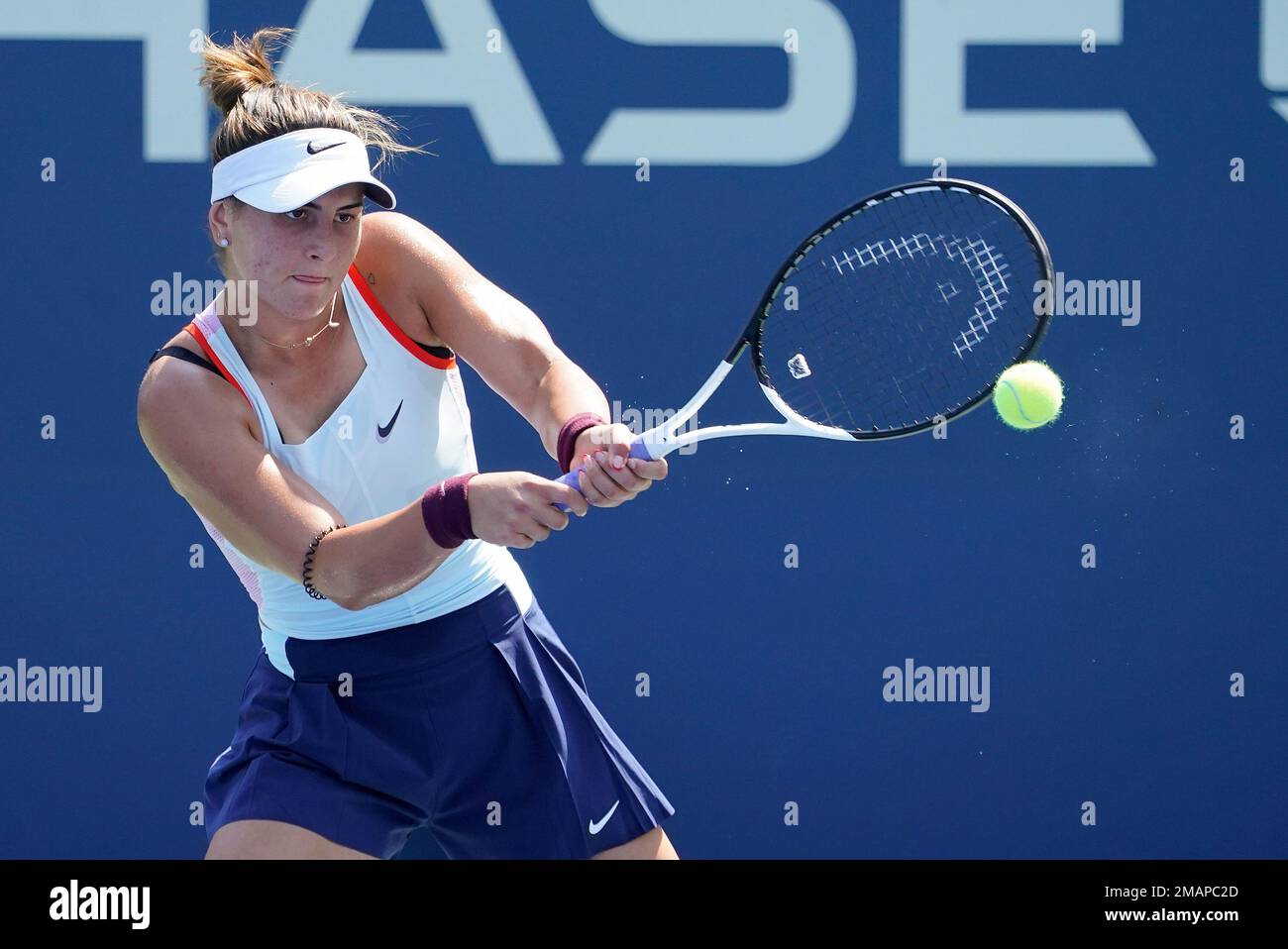 Bianca Andreescu, of Canada, returns a shot to Harmony Tan, of France