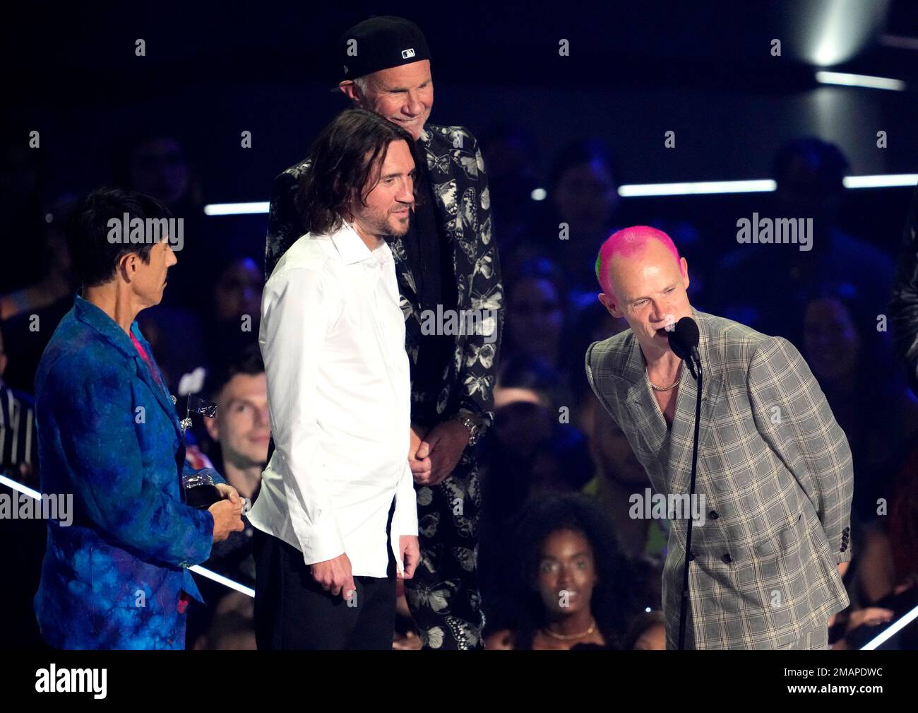 Flea, of Red Hot Chili Peppers, accepts the award for best rock for