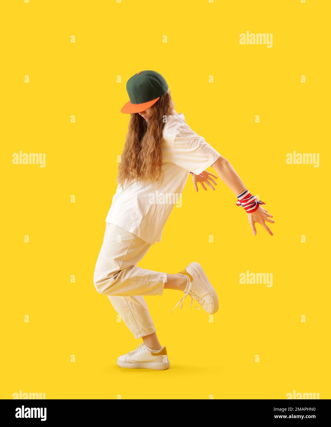 female-hip-hop-dancer-on-yellow-background-stock-photo-alamy