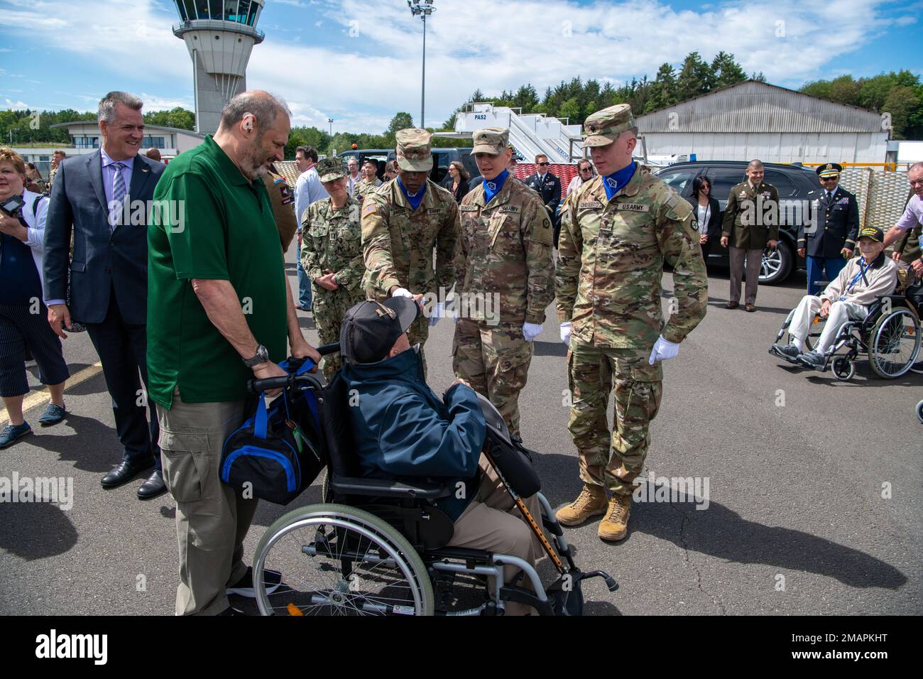 World War II Veterans greet Soldiers of V CORPS at a welcoming ceremony June 2, 2022 at Aéroport de Deauville Saint Gatien des Bois, France. Together, the US and our indispensable European allies are demonstrating the strength of alliance and dedicated resolve borne out of D-Day 78 years ago and forged over almost eight decades of combat-credible cooperative security. Stock Photo
