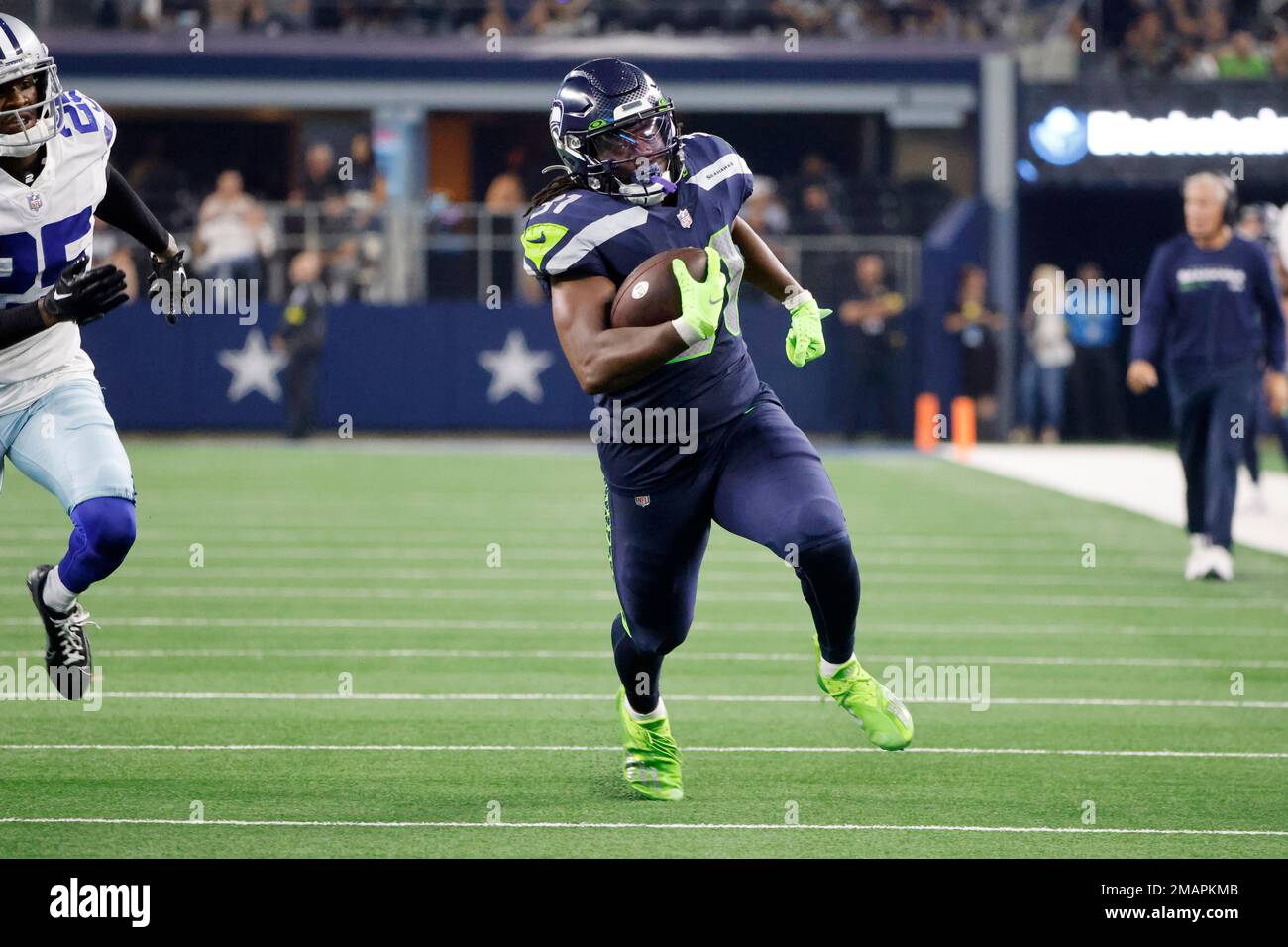 Seattle Seahawks running back DeeJay Dallas (31) runs during a