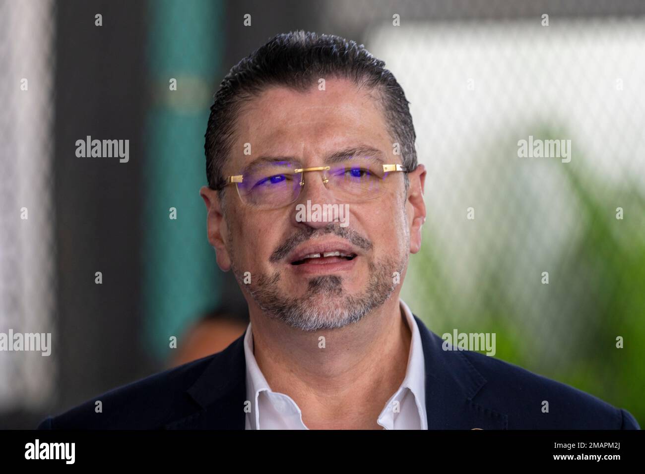 Costa Rica's President Rodrigo Chaves walks during a visit to Goal ...