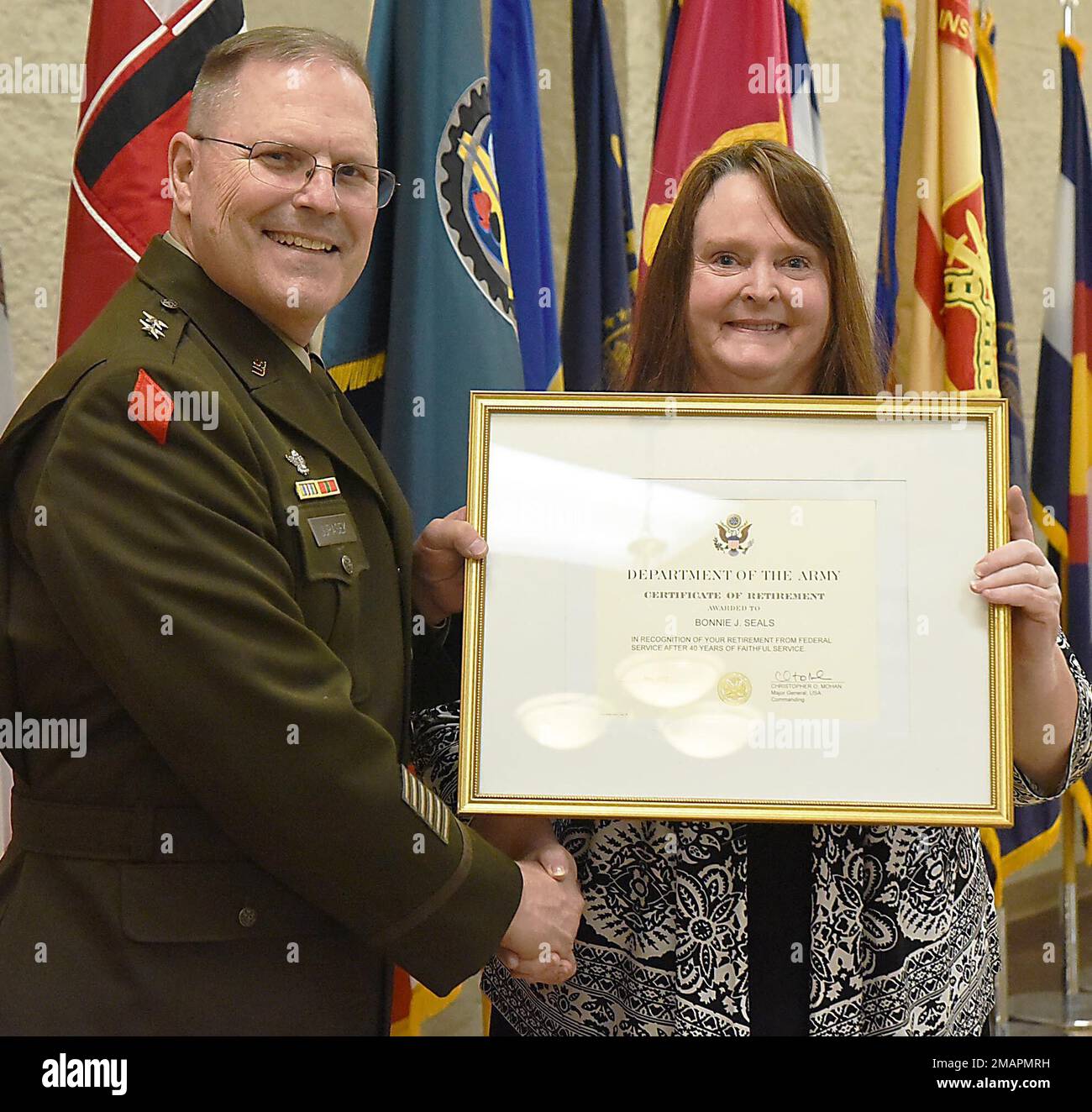 Maj. Gen. Jeffrey Jurasek, deputy commanding general for support, First U.S. Army, congratulates