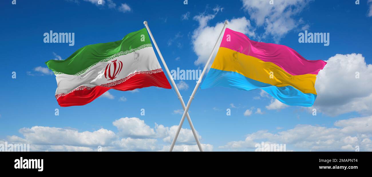 two crossed flags Pansexuality Pride and Iran waving in wind at cloudy ...