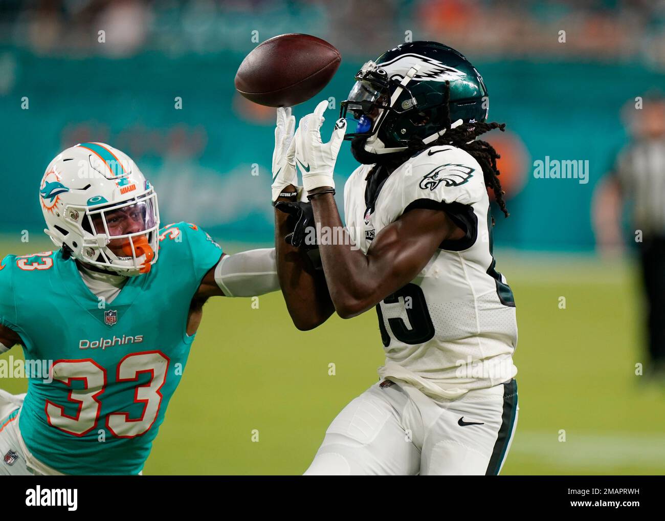 Miami Dolphins cornerback Elijah Hamilton (33) follows a play