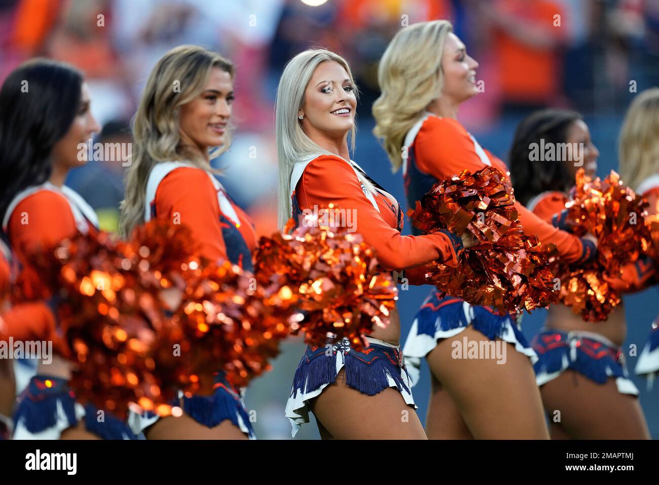 The Denver Broncos cheerleaders perform during the first half of