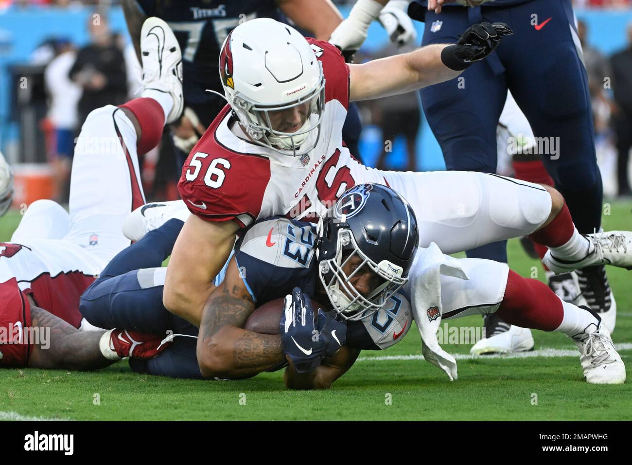 Tennessee Titans linebacker Ben Niemann (47) tackles Chicago Bears running  back Roschon Johnson (30) during the