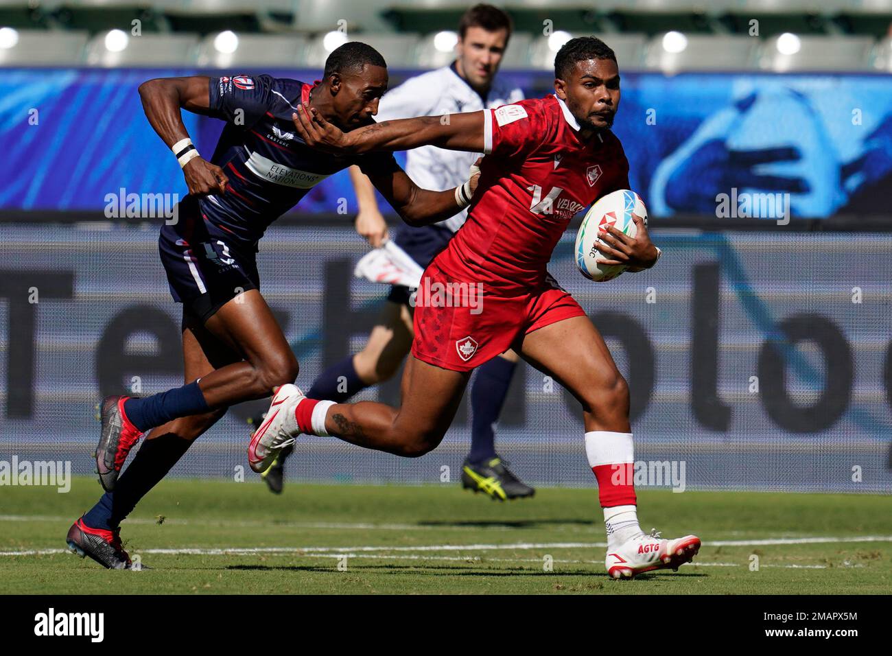 United States' David Still attempts too tackle Canada's Josiah Morra