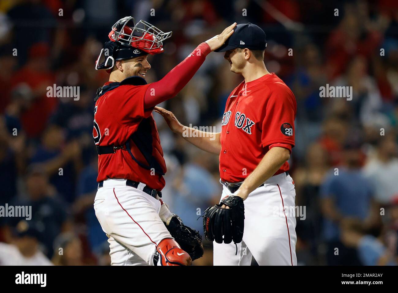 Boston Red Sox's Garrett Whitlock, right, and Kevin Plawecki celebrate