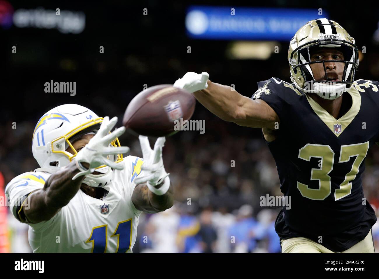 New Orleans Saints cornerback Brian Allen (37) breaks up a pass intended  for Los Angeles Chargers wide receiver Jason Moore Jr. (11) during the  first half of a preseason NFL football game