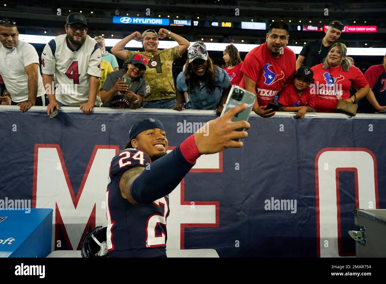 Houston Texans cornerback Derek Stingley Jr. (24) takes a selfie