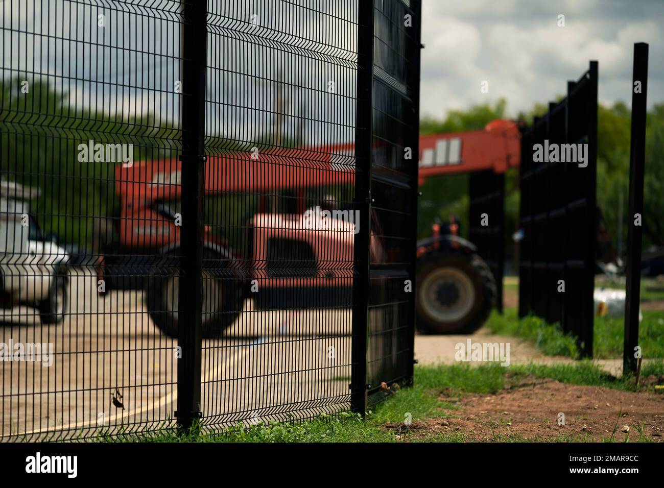 New fencing is constructed around Benson Elementary School, Thursday