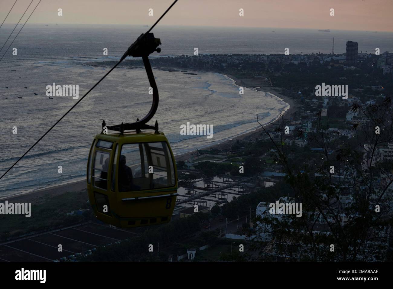 Tourist travel on ropeway to Kailasagiri hills on the bay of Bengal ...