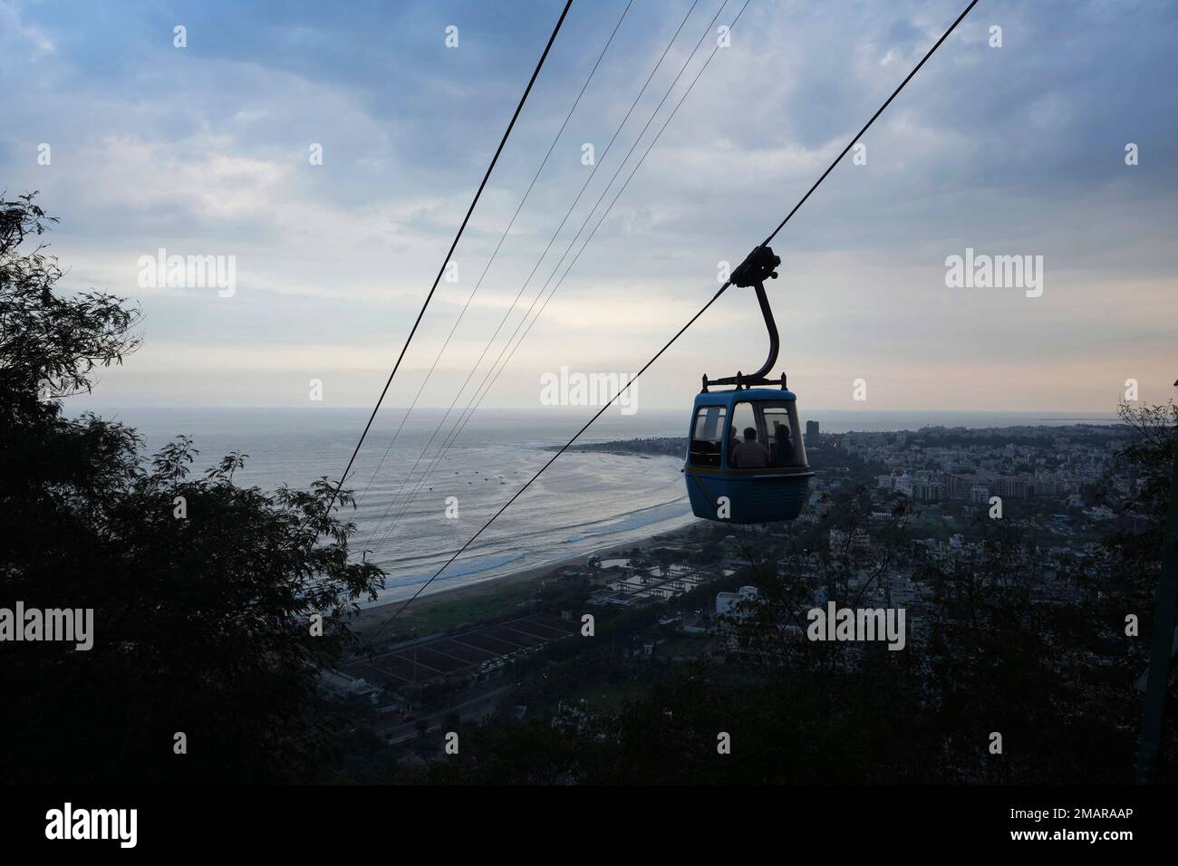 Tourist travel on ropeway to Kailasagiri hills on the bay of Bengal ...