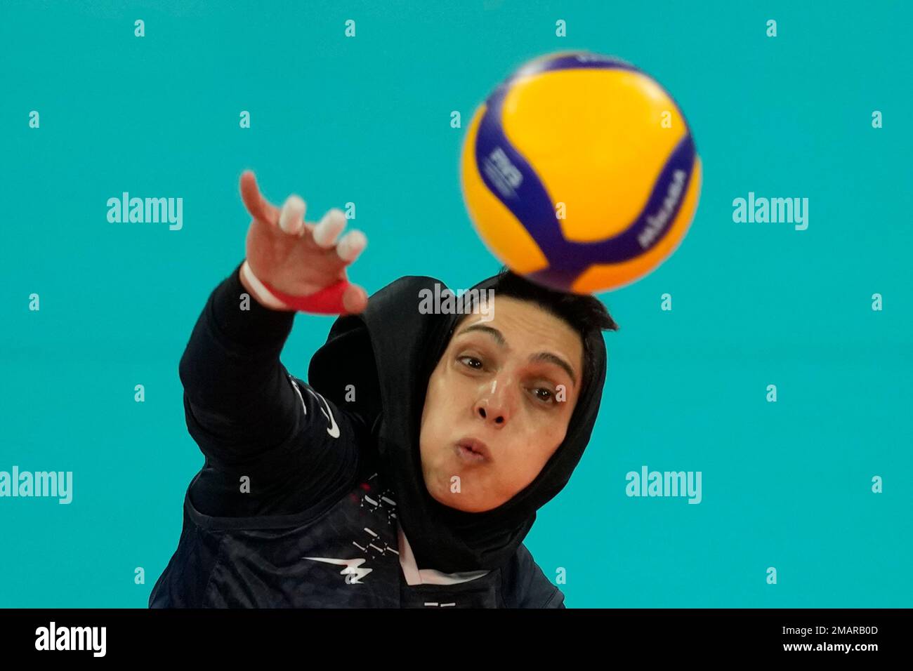 Iran's Maedeh Borhani Esfahani hits the ball during their preliminary