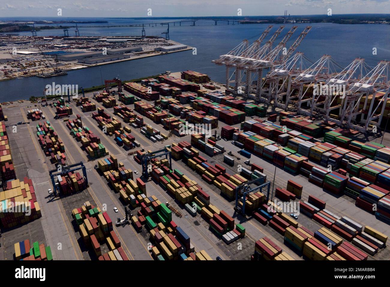 Shipping containers are stacked together at the Port of Baltimore ...