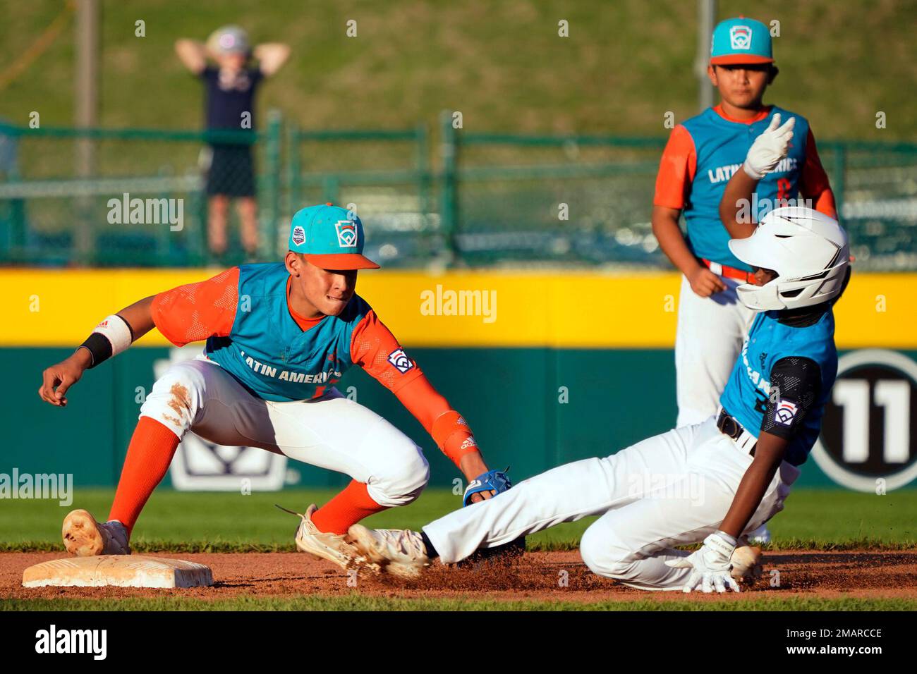 Nicaragua shortstop Luis Garcia (13) fields a ball hit by Panama's