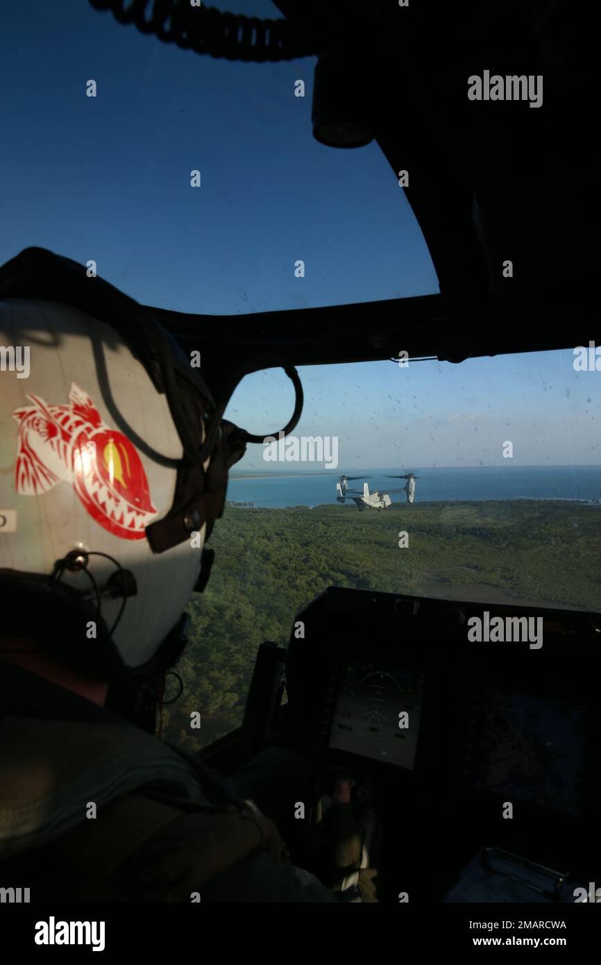 U.S. Marine Corps pilot with Marine Medium Tiltrotor Squadron (VMM) 268, flies a U.S. Marine Corps MV-22 Osprey during a celebration of the Platinum Jubilee of Queen Elizabeth II, off the coast of Darwin, NT, Australia, June 3, 2022.  The Marines and Australian Defence Force flew Ospreys and Australian Army 22 Airbus Tiger attack helicopters in a formation over the city of Darwin to celebrate the Queen’s 70 years on the throne. Stock Photo