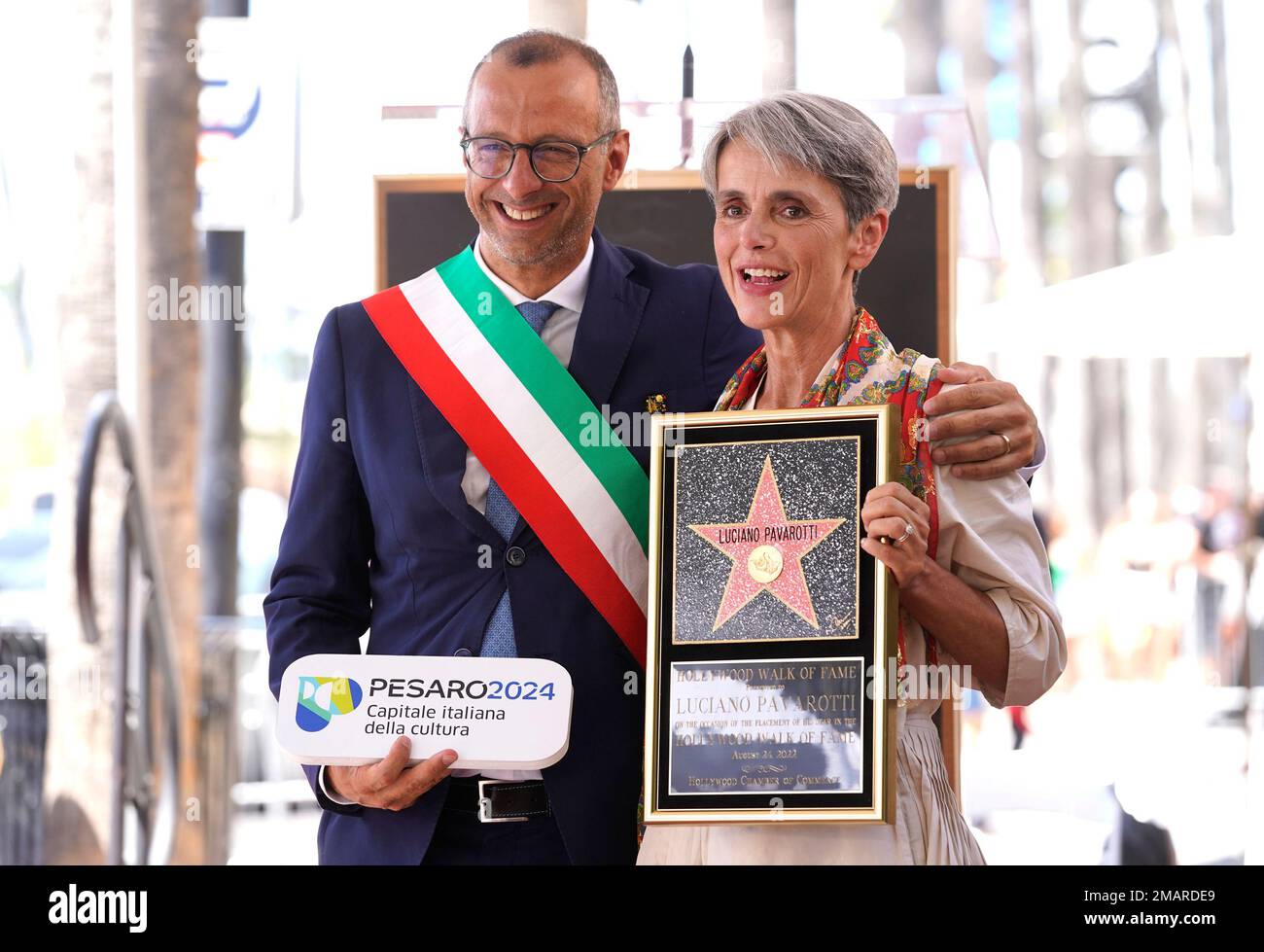 matteo-ricci-mayor-of-pesaro-italy-left-and-cristina-pavarotti