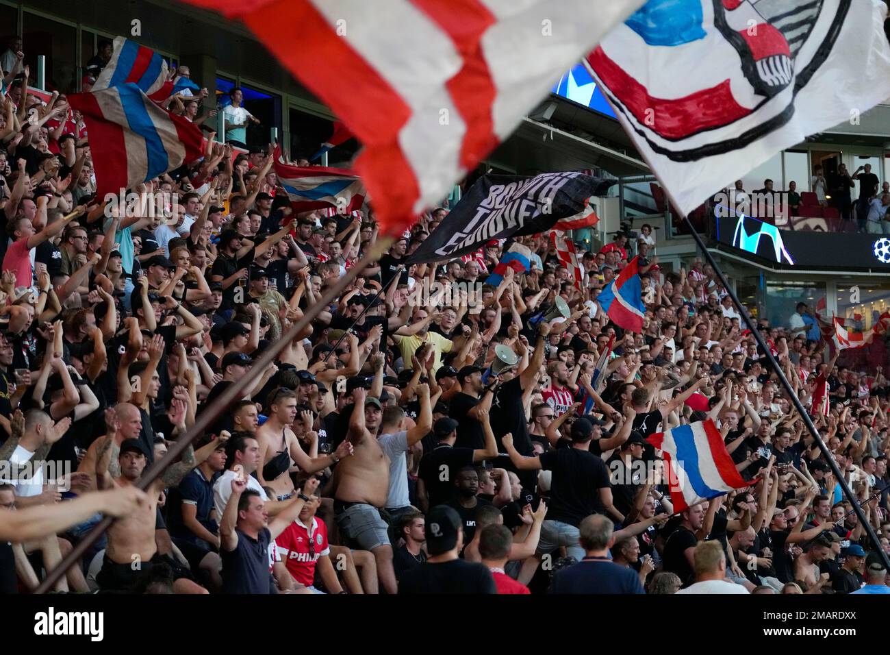 PSV supporters cheer prior to the start of a Champions League playoff ...