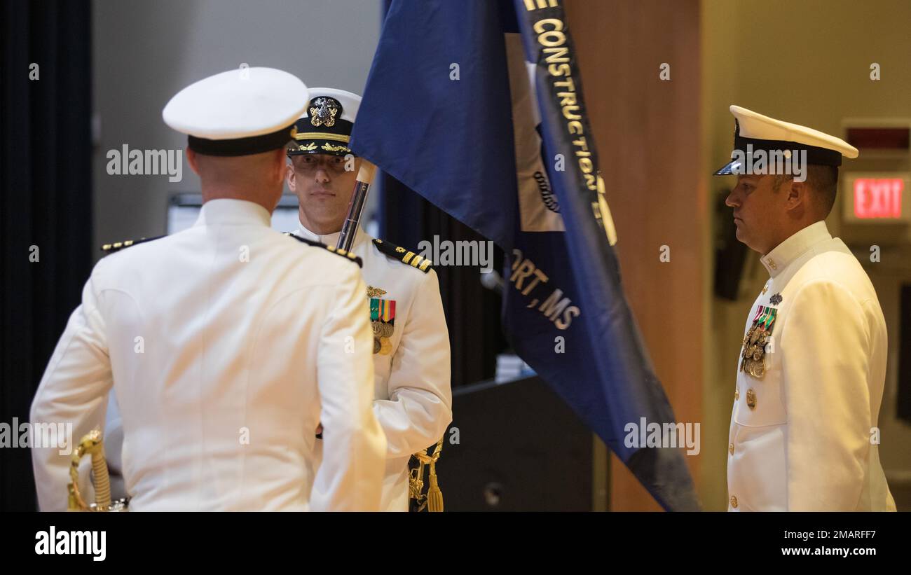 220603-N-MM936-001 Commander Michael W. McCain transfers the command colors to Commander Benjamin C. Waite. Stock Photo