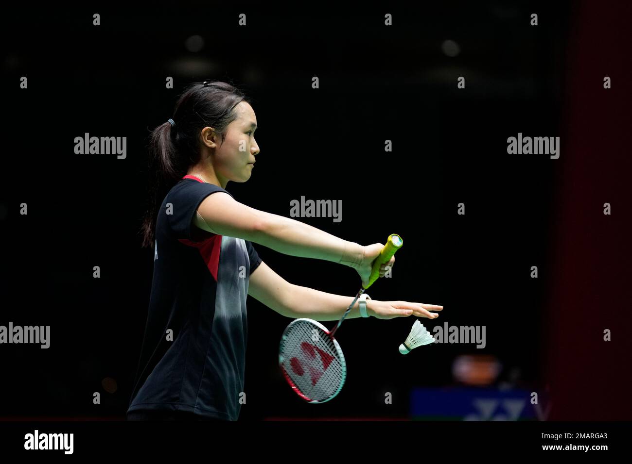 Yeung Pui Lam of Hong Kong, with Yeung Nga Ting, serves during a