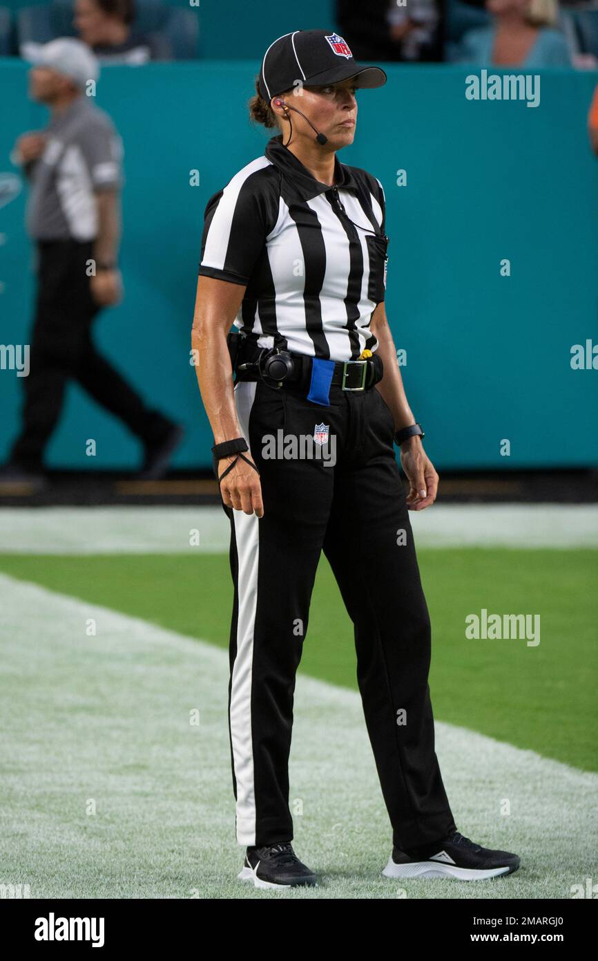 NFL Down Judge Robin DeLorenzo stands on the field during an NFL