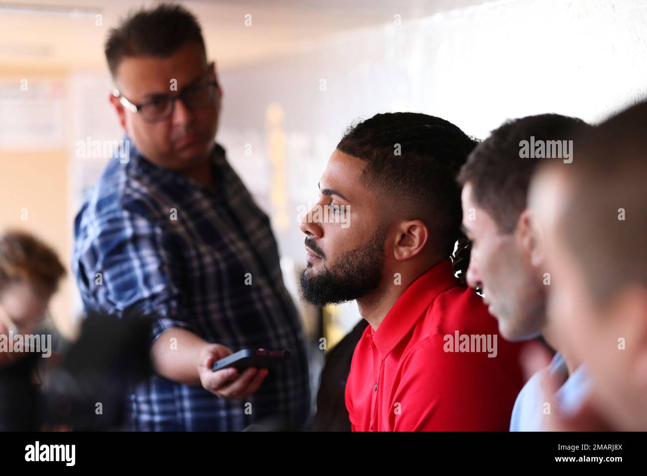 San Diego Padres' Fernando Tatis Jr., third from the right, looks on