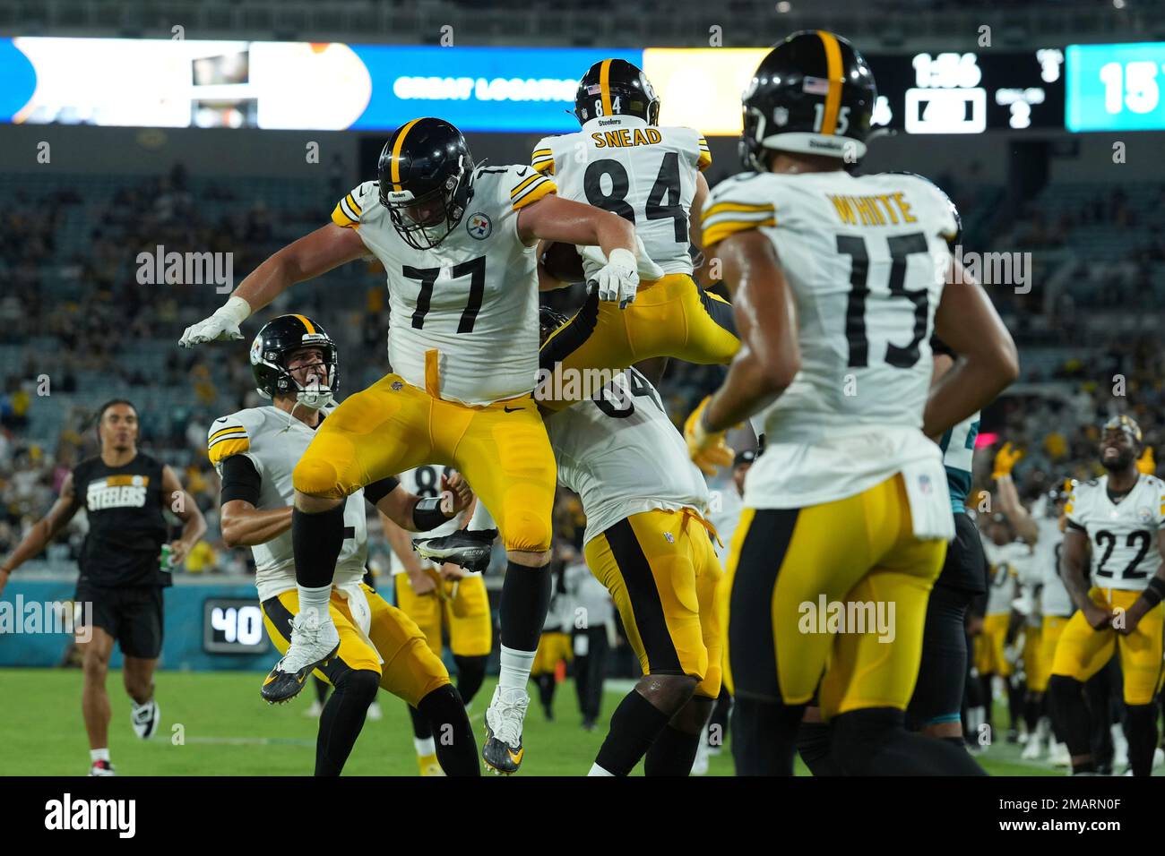 Pittsburgh Steelers wide receiver Tyler Snead (84) celebrates his touchdown  reception with Pittsburgh Steelers offensive tackle John Leglue (77) during  an NFL football game against the Jacksonville Jaguars, Saturday, Aug. 20,  2022