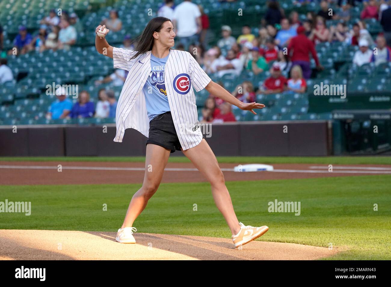 University of Iowa Women's basketball player Caitlin Clark throws out a  ceremonial first pitch before a baseball game between the Chicago Cubs and  the St. Louis Cardinals Monday, Aug. 22, 2022, in