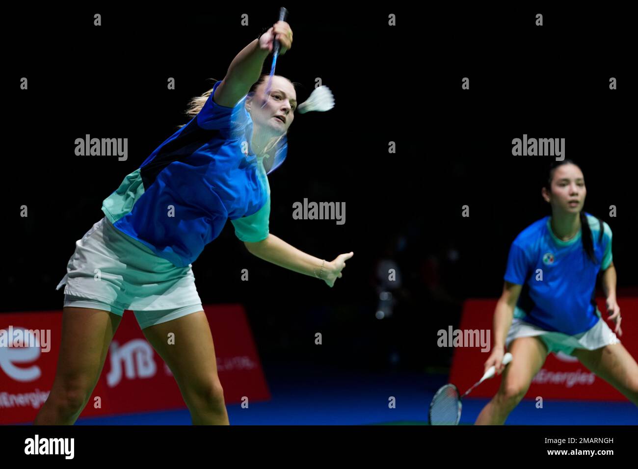 Judith Mair of Italy, left, with Martina Corsini, plays a return in a  badminton game of the women's doubles against Shikha Gautam and Ashwini  Bhat K. of India in the BWF World