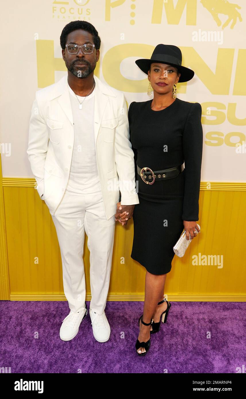 Sterling K. Brown, left, and his wife Ryan Michelle Bathe pose together