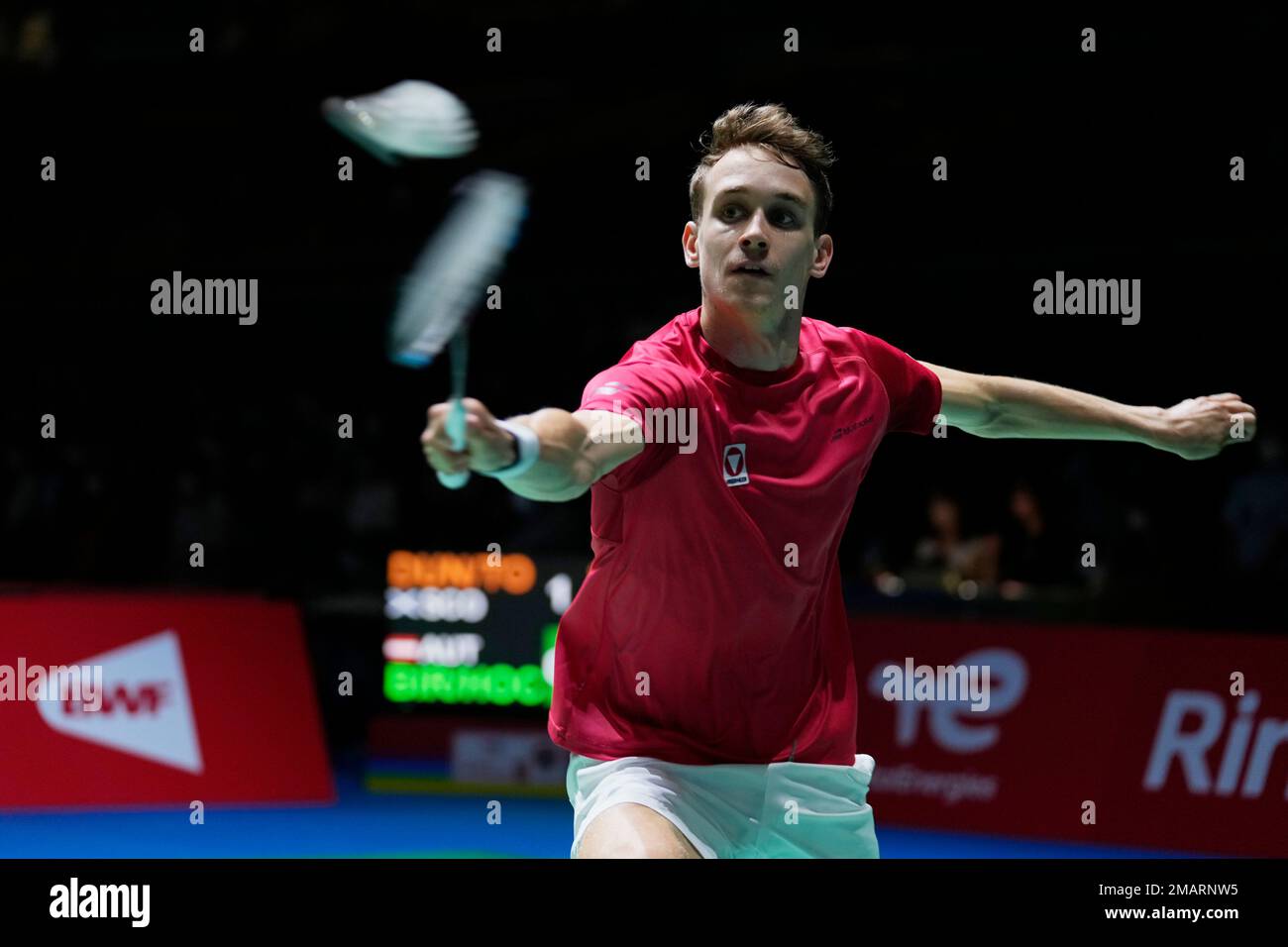 Philip Birker of Austria, with Katharina Hochmeir, plays a return during a  badminton game of the mixed doubles against Alexander Dunn of Scotland and  Ciara Torrance of Scotland in the BWF World