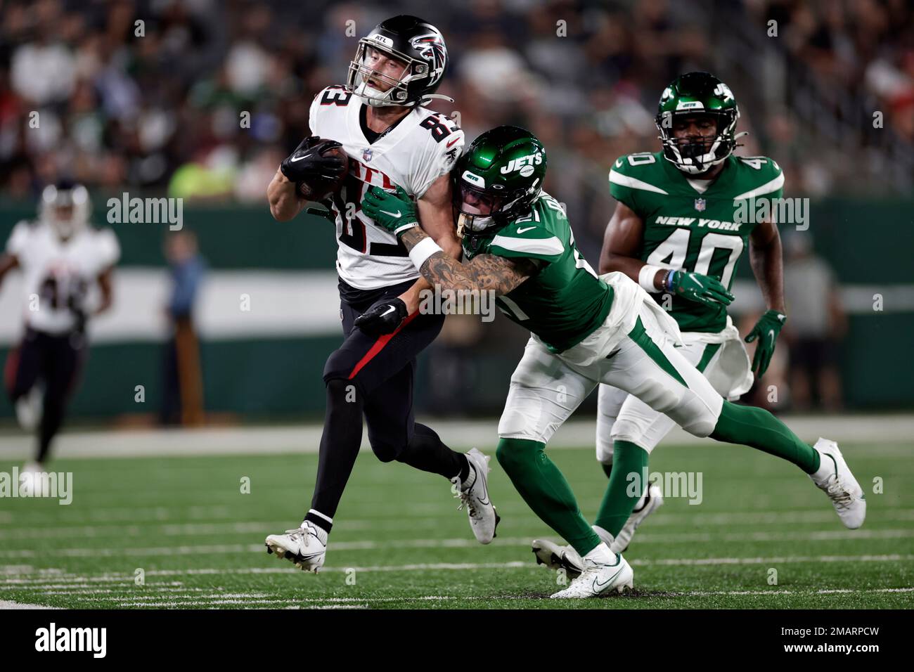 Atlanta Falcons wide receiver Jared Bernhardt (83) runs with the ball  against the New York Jets