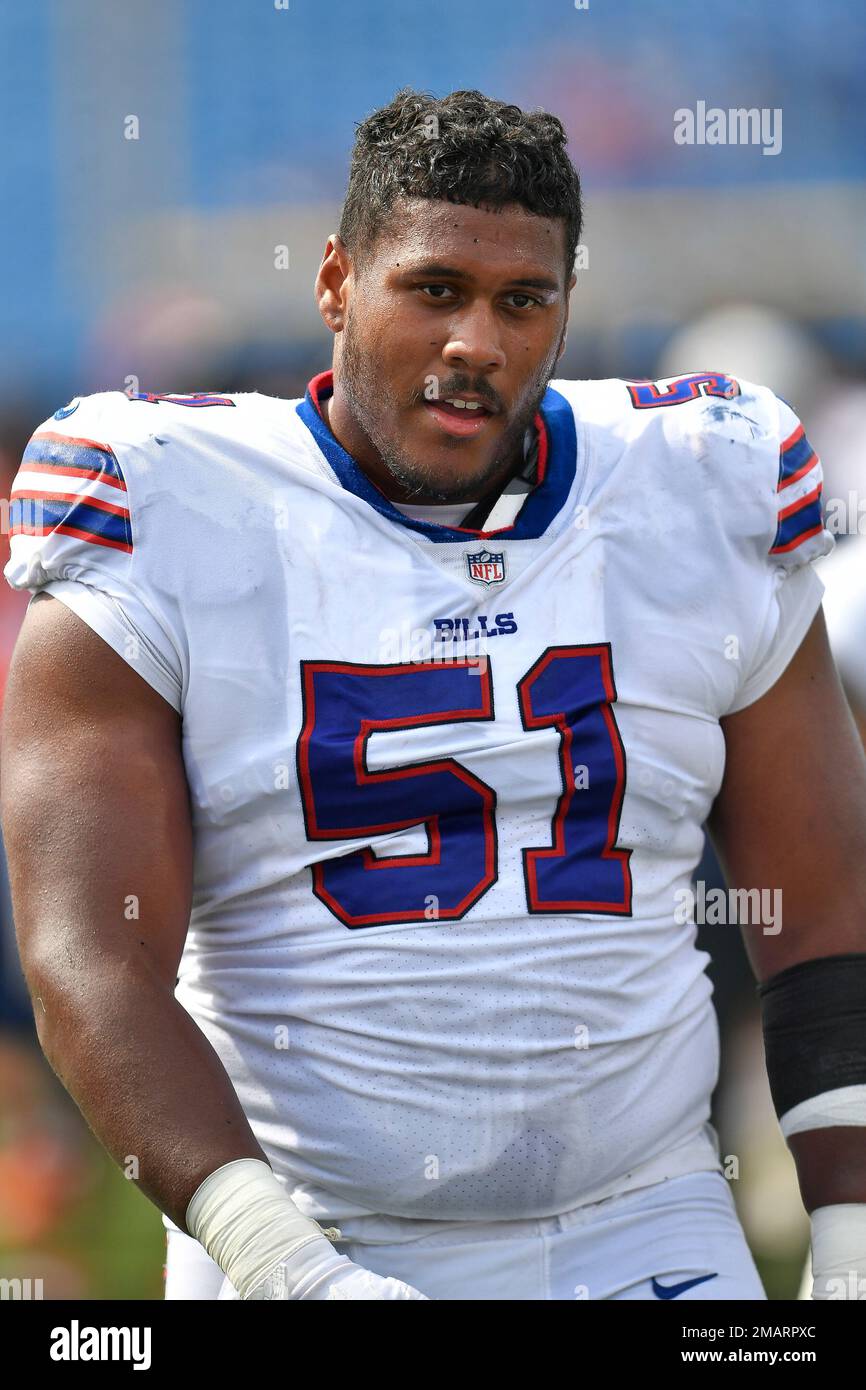 Buffalo Bills defensive tackle Brandin Bryant, left, and defensive tackle  Eli Ankou walk off the field after a preseason NFL football game against  the Denver Broncos in Orchard Park, N.Y., Saturday, Aug.