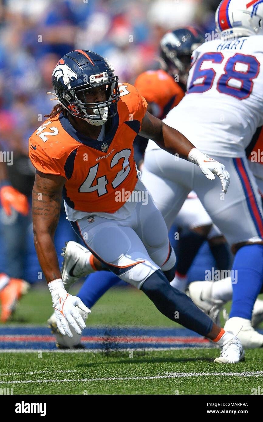 Denver Broncos linebacker Nik Bonitto walks off the field after a preseason  NFL football game against the Buffalo Bills in Orchard Park, N.Y.,  Saturday, Aug. 20, 2022. (AP Photo/Adrian Kraus Stock Photo 