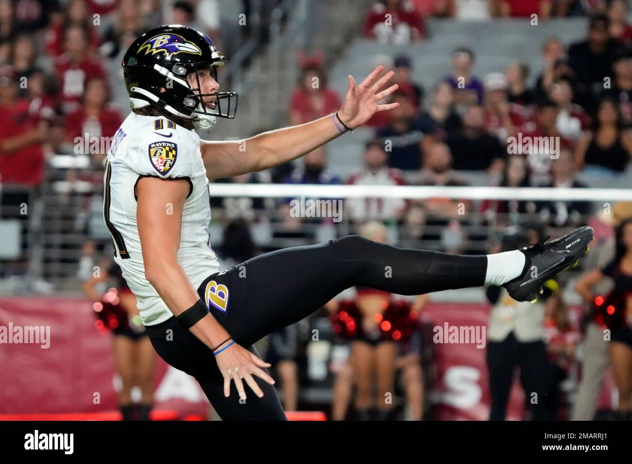 Baltimore Ravens punter Jordan Stout (11) during the first half of an ...