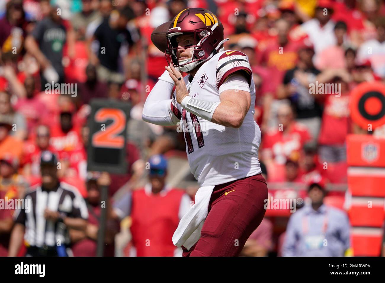 Washington Commanders quarterback Carson Wentz passes during a