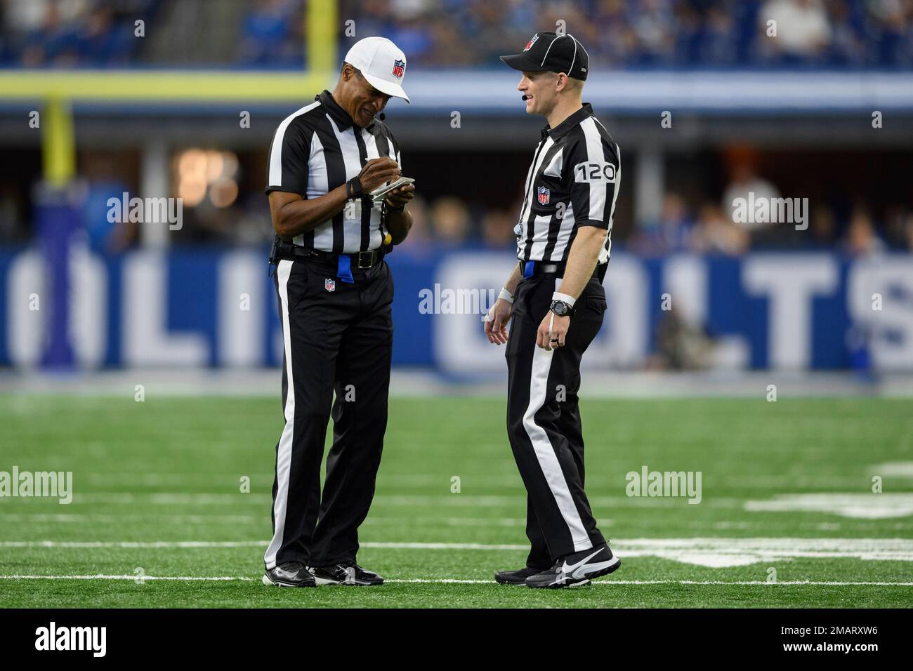 NFL referee Jerome Boger (23) and NFL Side Judge Jonah Monroe (120) on
