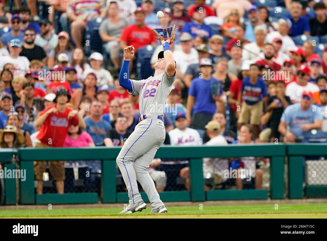 New York Mets third baseman Brett Baty catches a fly out by