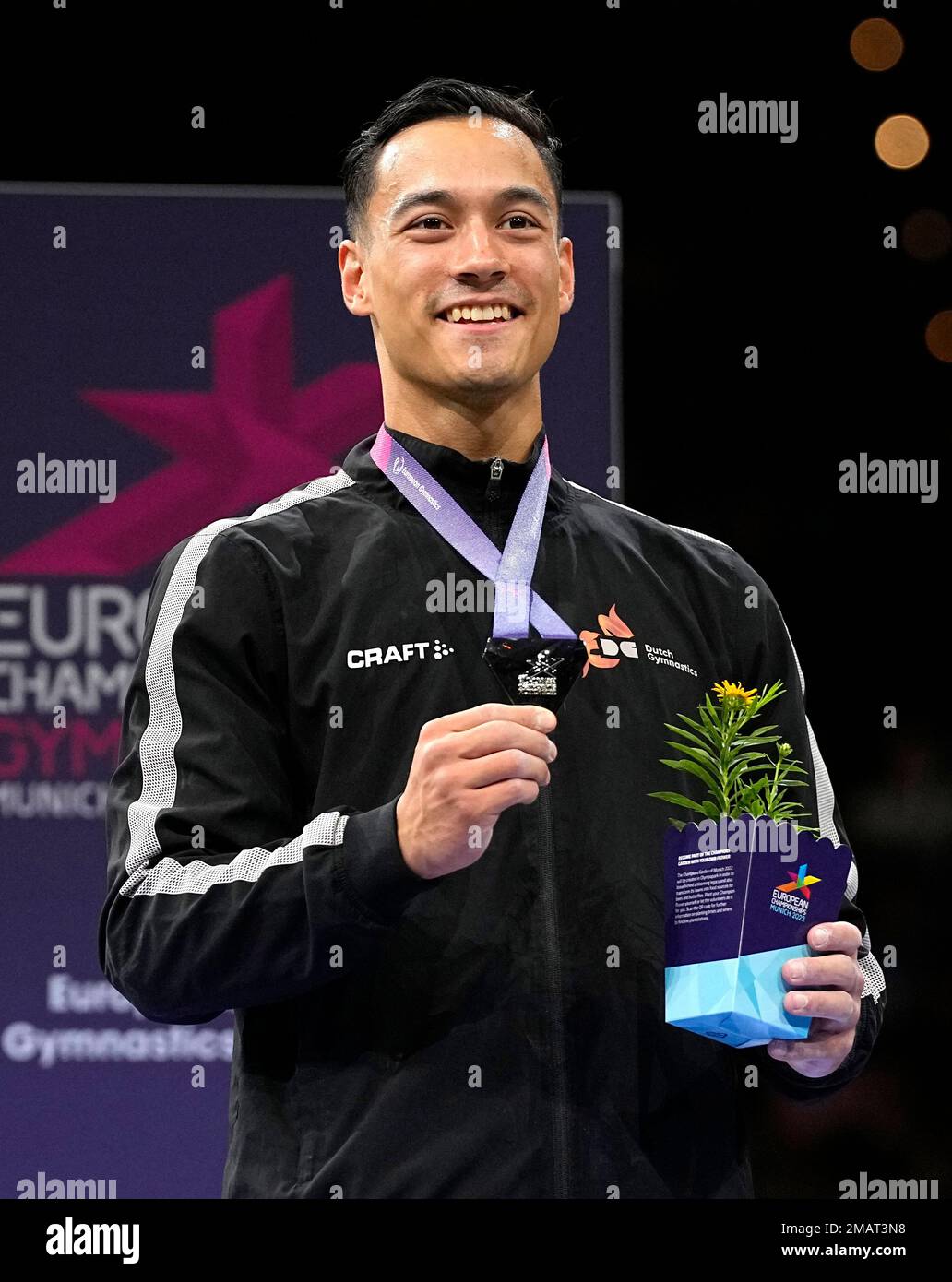 Silver medalist Loran De Munck of the Netherlands poses with his medal