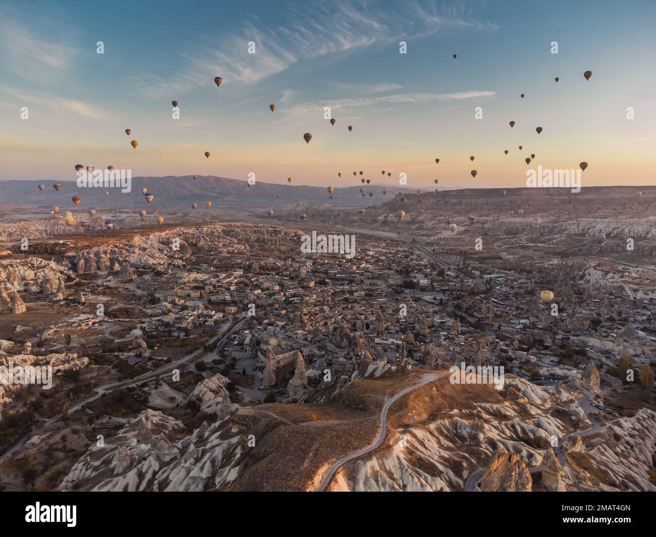 hot air balloons at fairy chimneys at sunrise in G reme, Cappadocia. Turkey Stock Photo