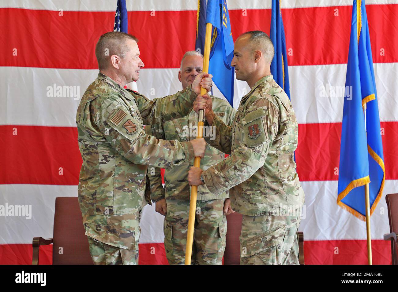 Brig. Gen. Rolf Mammen, commander of the 127th Wing, hands the guidon off to Lt. Col. Sam Trapasso during the 127th Mission Support Group Change of Command ceremony at Selfridge Air National Guard Base, June 4, 2022. Trapasso took command of the 127th Mission Group at the ceremony. Stock Photo