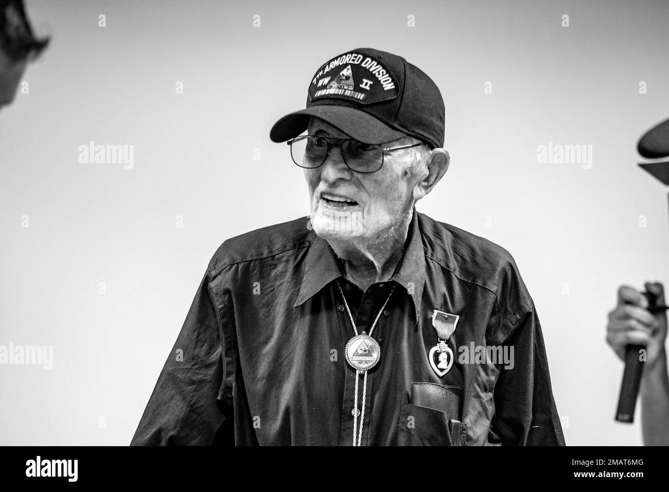 U.S. Army Capt. Darren Cinatl pins a Purple Heart on John Althuizen at the Normandy Victory Museum, France, June 3, 2022. Althuizen fought heroically alongside the 7th Armored Division as a translator during World War 2. Stock Photo