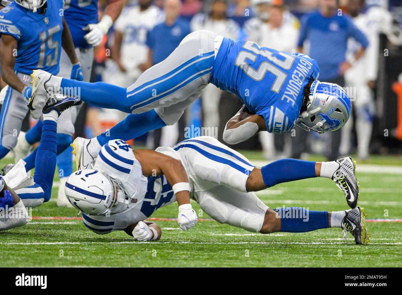 Detroit Lions running back Godwin Igwebuike (35) is tackled during the  first half of an NFL foo …