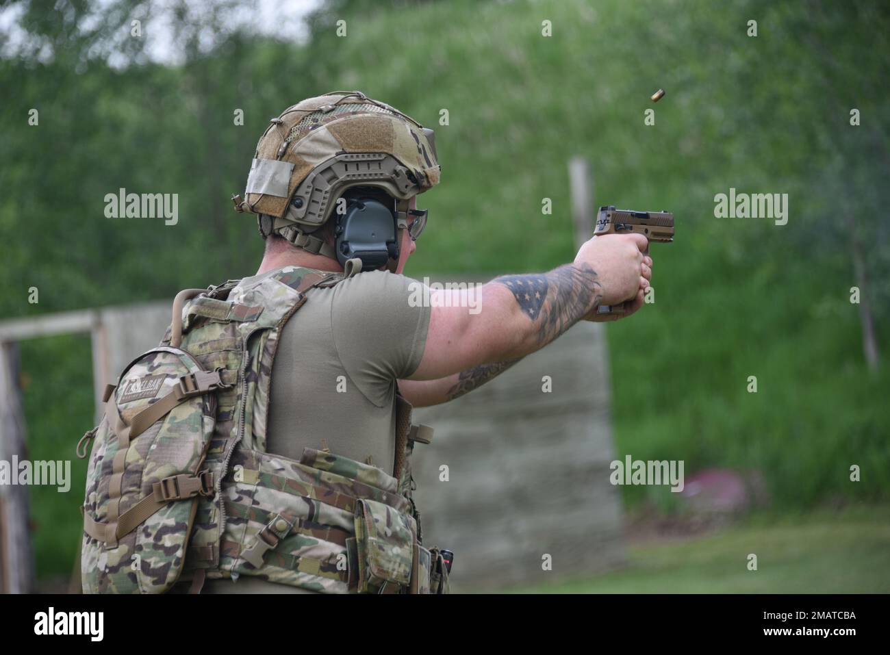 185th Air Refueling Wing Security Forces member Senior Airman Ethan Hanson, shoots an M18 pistol on June 4, 2022, at the 185th ARW firing range in Sioux City, Iowa. Hanson, along with the other Security Forces personnel must complete the weapons qualification training annually. Stock Photo