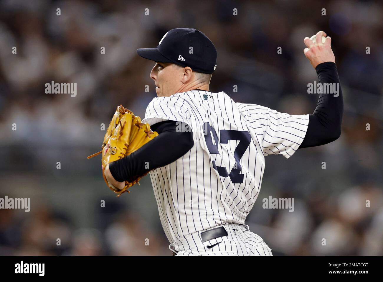 New York Yankees pitcher Ron Marinaccio (97) throws during the ninth inning  of the team's baseball game against the Toronto Blue Jays on Friday, Aug.  19, 2022, in New York. The Blue